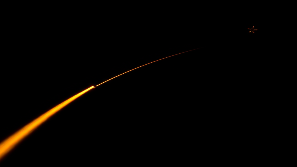 A small plane silhouette on a rising amber line against a dark navy sky, no cockpit or HUD